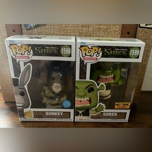 Funko pop Fonkey with Glitter #1598 and shrek Hot Topic
Exclusive #1599